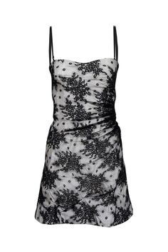 Be the ultimate it girl in this playful Dolce & Gabbana dress! Featuring black floral lace and a ruched silhouette, this sleeveless mini dress can be worn as a strapless dress or with spaghetti straps for a personalized look. Style with a black strappy heel and matching clutch for a killer ensemble. Size 4 (IT 40) Shell 50% Cotton, 50% Polyamide Lining 50% Cotton, 42% Polyamide, 8% Elastane Exposed back zipper Ruched detail Removable and adjustable straps Bust 28" Waist 26" Shoulder to hem 35" Ruched Lace Mini Dress For Party, Ruched Sleeveless Lace Dress, Ruched Lace Mini Dress For Night Out, Lace Mini Dress With Ruched Details For Night Out, Lace Ruched Mini Dress For Night Out, Black Lace Dress With Ruched Detail, Black Lace Ruched Dress, Flirty Ruched Lace Mini Dress, Chic Lace Dresses With Ruched Detail