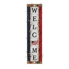 a welcome home sign with the american flag painted on it