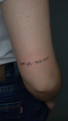 a woman's arm with the words art was made for written on her left side