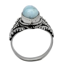 Also known as a Caribbean king, Larimar is a perfect representation of tranquil sea and sky energies. It's soft & soothing blue with shades of white reminds you of sunlight dancing beneath the Caribbean waters. Larimar is believed to radiate energy of love and calmness. Dominican Republic is the only source of Larimar in the world. Add this blue stone to your collection today. Gemstone - Larimar - Not TreatedMetal - 925 Sterling SilverStone Size - 7 x 14 mm, Product Weight - 5.00 gm".925" sterli Shades Of White, Dominican Republic, The Caribbean, Blue Stone, Unique Colors, Statement Ring, Statement Rings, Natural Stones, Of Love