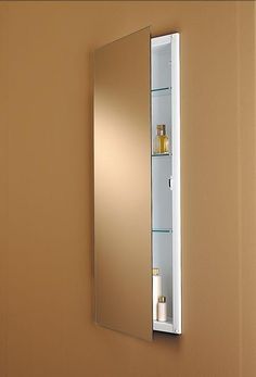 a bathroom medicine cabinet with its door open