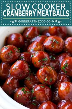 slow cooker cranberry meatballs in a white bowl with text overlay