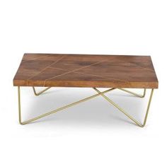 a wooden table with gold metal legs and a wood slab on the top that is shaped like a diamond