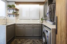 a washer and dryer in a small kitchen