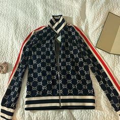 Brand New With Tags Gucci Blue Outerwear For Spring, Gucci Blue Spring Outerwear, Blue Gucci Outerwear For Spring, Luxury Gucci Long Sleeve Outerwear, Chic Gucci Long Sleeve Outerwear, Chic Long Sleeve Gucci Outerwear, Designer Gucci Outerwear, Designer Gucci Long Sleeve Outerwear, Designer Long Sleeve Gucci Outerwear