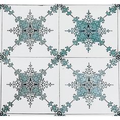 an intricately designed tile pattern in blue and white