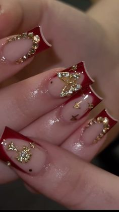 Red French Tip with Gold Diamond Jewlery Acrylic Nails Xv Nails Red, Red And Gold Bling Nails, Burgundy Red Nails Acrylic, Red And Gold Nail Designs Short, Short Gold Nails Acrylic, Red Nails With Gold Gems, Latina Red Nails, Nail Ideas2024, Red Gold Nails Acrylic