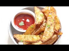 french fries with ketchup in a white bowl