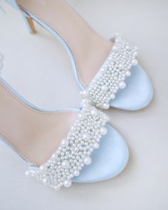 Classic satin high heel sandals adorned with allover pearls on the vamp and pearl ankle strap for romantic, elegant and feminine look. The delicate pearl beads are placed to create a graceful classic style. Simple and easy wear for bridal wear, bridesmaids, holiday party, wedding parties, and any special occasions. The light blue color can easily be your something blue.DETAILS:HEEL HEIGHT: 3.5 InchesCOLORS AVAILABLE: White, Ivory, Light Blue, Champagne, FuchsiaUPPER: Synthetic upper and liningMA Blue Champagne, Trendy Bride, Mid Calf Dresses, Drawstring Dresses, Women's Robe, Wedding Sandals, Wedding Parties, Evening Shoes, Grey Shoes