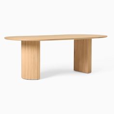 an oval wooden table on a white background