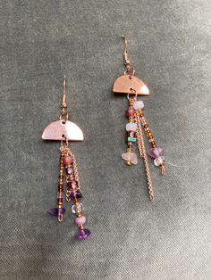 Dangling Bohemian rose gold beaded earrings. Purple and white glass beads with amethyst and Rose quartz stone beads. Bohemian Rose Gold Wire Wrapped Earrings, Bohemian Rose Gold Dangle Earrings, Gold Beaded Earrings, Amethyst And Rose Quartz, Gold Bead Earrings, Handmade Rose, Rose Gold Beads, Earrings Purple, Rose Quartz Stone