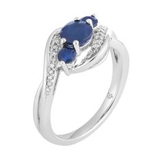 Embellished with round-cut sapphires and diamonds, this 10k white gold three-stone ring is altogether captivating.RING DETAILSWidth: 10.60 mmMetal: 10k white goldPlating: rhodiumFinish: polishedPackaging: boxedSTONE DETAILSStone type: sapphireTotal weight: 1/6 ct.Center stone size: 6 mm x 4 mmShape: roundSetting: prongDIAMOND DETAILSTotal weight: 1/10 ct.Color grade: I-JClarity: I2-I3Shape: roundSetting: prongGemstones may have been treated to enhance their appearance. Special care may be requir Geometric Wolf Tattoo, Geometric Wolf, White Gold Sapphire, 3 Stone Rings, Three Stone Rings, White Stone, Ring Gold, Three Stone, Stone Ring