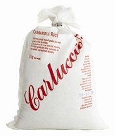 a white bag with red lettering on it