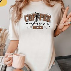 Coffee Makes Me Nicer T-shirts, Coffee Lover Gift, Coffee T-shirts, Iced Coffee Weather Graphic Shirts, Coffee T-shirts To Sober Up Welcome to our store!  We specialize in fashionable products designed to ensure high satisfaction. Please review all the photos provided for detailed views of our items. 💫HOW TO ORDER: To place an order, please select the desired SIZE and COLOR from the drop-down menu for each shirt. You can adjust the quantity for the same color and size as needed. 💫MATERIAL: Our Coffee Crew Neck Top With Slogan, Coffee Colored Crew Neck Top With Slogan, Coffee Colored Slogan Short Sleeve Top, Coffee Colored Short Sleeve Slogan Top, Coffee-colored Cotton T-shirt With Letter Print, Coffee Short Sleeve Top With Slogan, Coffee Cotton T-shirt With Letter Print, Coffee Color Short Sleeve Top With Slogan, Coffee-colored Graphic Tee With Letter Print