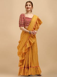 Mustard Yellow Ruffled Saree - Inddus.com Festive Cotton Pre-draped Saree With Printed Border, Cotton Pre-draped Saree With Unstitched Blouse For Puja, Yellow Cotton Silk Pre-draped Saree With Unstitched Blouse, Art Silk Pre-draped Saree With Printed Border, Festive Pre-draped Saree With Printed Border, Yellow Handloom Blouse With Traditional Drape, Yellow Pre-draped Saree For Puja With Unstitched Blouse, Anarkali Blouse Piece With Printed Border For Designer Wear, Pre-draped Saree With Printed Border For Puja