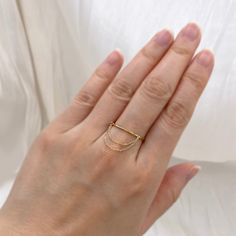 Delicate dangling chain ring crafted in 10K yellow gold. Made to Order Ship within 3-4 weeks. - Band width: 1.15mm approx. - Chain width: 0.85mm approx. - Made in 10 karat gold. - Stamp with 10k. Minimal Gold Jewelry, Minimal Gold, Jewelry Minimalist, Ring Crafts, Chain Ring, Minimalist Jewelry, Gold Jewelry, Yellow Gold, Stamp