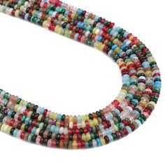 multicolored glass beads are arranged together