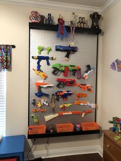 Nerf Wall, Boys Bedroom Storage, Nerf Storage, Kids Basement, Car Themed Bedrooms, Boys Game Room, Star Wars Bedroom, Nerf Party, Basement House