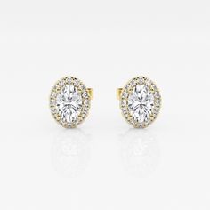 These imperial looking oval stud earrings are one of our best sellers. Large oval cut lab grown diamonds with a halo of round diamonds are a true amalgamation of style and glamor. Oval Halo Diamond Earrings, Oval Yellow Gold Diamond Earrings, Classic Oval Diamond White Diamond Earrings, Classic Oval Diamond White Earrings, Oval Diamond Earrings With Halo Setting For Anniversary, Oval Yellow Gold Diamond Earrings For Anniversary, Oval Halo Diamond Earrings For Anniversary, Classic Oval Halo Setting Earrings, Oval Halo Setting Earrings For Anniversary