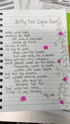 a handwritten poem on lined paper with pink flowers and green leaves in the background