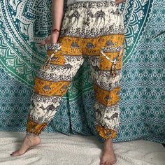 Thai Drawstring two pocket Harem Pants Waist: 23" - 46Hip: 50"Lenght: 43"Inseam: 28"Pockets: twoWeight: 170g Bohemian Drawstring Trousers, Beach Cotton Cargo Pants With Pockets, Cotton Cargo Pants With Pockets For Beach, Bohemian Drawstring Loungewear Pants, Bohemian Drawstring Pants For Loungewear, Beach Bottoms With Side Pockets And Long Pants, Harem Pants With Pockets For Beach, Beach Harem Bottoms With Pockets, Bohemian Summer Cargo Pants With Pockets