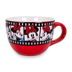 a red mickey mouse coffee cup on a white background