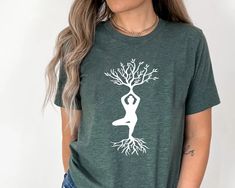 "Tree of Life Yoga, Funny Yoga Shirt, Yoga Teacher Tee, Meditation Shirt, Yoga Instructor Shirt, Yoga Tree, Yoga Shirt, Yoga Gift, Yoga Lover Please Check All Photos For Details.   🐞Choose Your T-Shirt Size From The Drop-Down Lists Next To The item Picture   ⭐Choose Of Your T-Shirt Color From The 2nd Picture   🐞Use \"Add message to Seller\" link On The Checkout Page To Send me the Following important Details For Your Order's Customization.   ⭐Shipping Time Varies by location (we are located in Sugar Land, Texas) please consider that our turn around time is 1 to 3 business days.     ⭐Which brand do you use for t-shirts? We use Gildan Softstyle, Bella Canvas Unisex, Hanes, Outlash, Tees,  District and Next Level when we have a shortage of stocks for certain colors and sizes. Our printing m Green Graphic Print Workout Top, Green Short Sleeve Yoga Top, Green Relaxed Fit T-shirt For Workout, Graphic Print Short Sleeve Tops For Yoga, Green Short Sleeve Yoga Activewear, Moisture-wicking Cotton T-shirt For Yoga, Cotton Moisture-wicking T-shirt For Yoga, Sporty Letter Print T-shirt For Yoga, Yoga Crew Neck Tops With Graphic Print