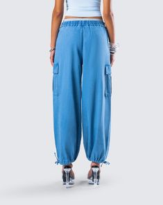 Add a little flare to your closet with these blue denim parachute pants 💙 With a chic yet casual feel, these pants complete with cargo pockets and a smocked waistband are the perfect piece for any occasion where you want to be the best dressed 😚 Spring Wide-leg Cargo Jeans With Cargo Pockets, Spring Wide-leg Cargo Jeans With Pockets, Denim Parachute Pants With Cargo Pockets, Wide-leg Cargo Jeans For Spring, Streetwear Straight Leg Cargo Jeans With Elastic Waistband, Streetwear Cargo Jeans With Elastic Waistband, Straight Leg Cargo Jeans With Elastic Waistband For Streetwear, Summer Washed Blue Cargo Jeans With Cargo Pockets, Washed Blue Cargo Jeans For Summer