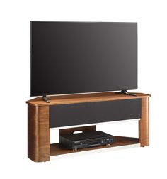 a flat screen tv sitting on top of a wooden entertainment center next to a remote control