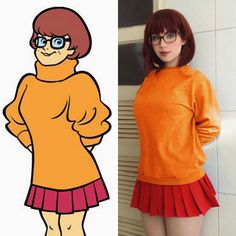 a woman with red hair and glasses standing next to an image of cartoon character in orange