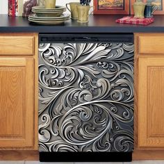 a dishwasher sitting on top of a kitchen counter next to a wooden cabinet