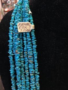 "Gorgeous teal shade/color! Rare natural Fox Turquoise 7 multi strand necklace with stamped & signed sterling silver finish beads... made by recently deceased, 2nd generation Native American Indian jewelry artist, Tony Aguilar, Jr, of Santo Domingo / Kewa Pueblo. Tony died of covid-19. Sterling silver cap beads & cones are stamped & have his hallmark signature... see pics 30\" total length 485R - This stunning piece is coming from an exciting relationship with a well known & popu Jewelry Artist, American Indian Jewelry, Silver Caps, Multi Strand Necklace, Native American Indians, American Indian, Artistic Jewelry, Strand Necklace, Sterling Silver Bead