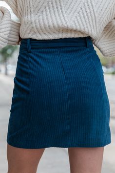 Details Navy Belted Corduroy Skirt Fabric has no stretch Adjustable removable belt, back zipper closure, functional pockets Pair this skirt with a cute sweater! Lined Size small from shoulder to hem: 16.5" Material and Care 100% polyester Machine wash cold, no drum drying Patterns may vary Materials may have natural variations Colors may vary from different viewing devices Fitted Corduroy Mini Skirt For Winter, Corduroy Mini Skort For Fall, Fall Corduroy Mini Skirt With Lining, Fall Mini Corduroy Skort, Corduroy Mini Skirt For Work, Trendy Corduroy Mini Skirt For Winter, Trendy Winter Corduroy Mini Skirt, Chic Corduroy Mini Skirt, Pink Activewear