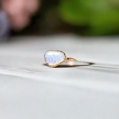 A stunning Australian Opal uniquely handcrafted by electroforming and set on an 14k Gold filled band.Whether to signify a blossoming Love, seal an eternal love or a special Friendship, this stunning Opal ring will be sure to make a unique engagement or wedding ring on that very special day! ❣This lovely rustic ring can also be offered on other special occasions such as a birthday, anniversary, Mother's Day, Christmas, or Valentine's Day.My rings are all custom-made to order using ethically sourc Australian Opal Ring, Rustic Ring, Stack Rings, Rustic Rings, Natural Gemstone Ring, Raw Diamond, Unique Engagement, Opal Ring, Australian Opal