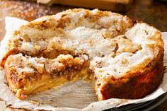 a partially eaten pie sitting on top of a wooden table