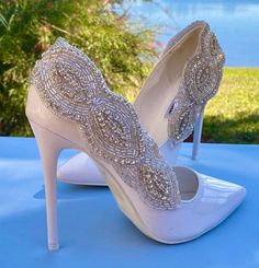 Beautiful shoe clips are the perfect accessory for any simple shoes.  Creates the finishing touch for any outfit.  They measure 9 x 3 inches. Elegant Beaded Party Heels, Wedding Heels With Bling And Pointed Toe, Bling Heels With Pointed Toe For Wedding, Elegant Embellished Heels For Wedding, Elegant High Heel Wedding Shoes With Bling, Elegant Rhinestone Wedding Shoes For Reception, Elegant Rhinestone Wedding Reception Shoes, Elegant Rhinestone Wedding Shoes, Chic Pointed Toe Shoe Clips For Wedding