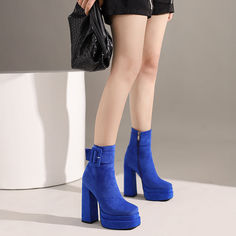 Looking for a boot that will make you stand out from the rest? Check out our blue platform boots! These stylish boots feature a square toe and are made from soft. suede material. They're also adorned with a buckle for a touch of elegance. Whether you wear them with jeans or a dress. these boots are sure to turn heads. Upper: Manmade Suede Lining: Short Plush Outsole: Rubber Toe: Square Toe Closure: Zip Heel: 14cm/5.5'' Platform: 4cm/1.5'' Shaft: 13.5cm/5.3'' Circumference: 25cm/9.8'' Color: Blue Blue High Heel Platform Boots For Party, Suede High Ankle Platform Boots For Party, Blue High Heel Platform Boots, High Heel Suede Platform Boots, Winter High Heel Platform Boots With Buckle, Blue Platform Boots For Party, Winter Blue Platform Boots, Winter High Heel Platform Boots With Buckle Closure, Suede Heeled Boots With Buckle Closure