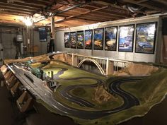 there is a model train set on display in the museum's exhibit room,