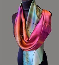 Add a touch of artistic elegance and thoughtful personalization to your outfit with this Hand Dyed Silk Abstract Skinny Long Silk Scarf. This exquisite accessory is handmade, ensuring each piece is truly one-of-a-kind. Crafted with delicate 100% silk, it drapes effortlessly around your neck, adding a luxurious and sophisticated touch to any ensemble. Its abstract design captures the imagination and sparks conversation, making it a unique and eye-catching statement piece. Whether it's for a birth Small Silk Scarf, Hand Dyed Silk Scarf, Personalized Scarves, Long Silk Scarf, Pure Silk Scarf, Silk Scarf Painting, Hand Painted Silk Scarf, Dyed Silk, Silk Shawl