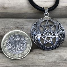 "925 Sterling Silver Double Pentagram Pendant Necklace Pendant size: 1.10\"x1.10\" (28x28mm) Included 18\" (45 cm) black leather cord with a lobster clasp and extender. Also you can add charms and personalize your necklace: http://etsy.me/2x6JVSr ENTER MY SHOP HERE: KalismaBijoux.etsy.com HANDMADE by ME - All my work is crafted with the utmost care in my studios - in Madrid, SPAIN CHANGES Don't hesitate to contact me if you have an idea or request. ABOUT MY PROCESS I am genuinely excited to make Gothic Round Engraved Necklaces, Adjustable Gothic Engraved Necklace, Gothic Engraved Adjustable Necklace, Adjustable Engraved Gothic Necklace, Gothic Star-shaped Jewelry For Festivals, Female Symbol, Pentagram Pendant, Pocket Watch, Leather Cord