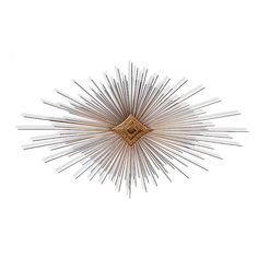 a gold and white starburst wall decoration