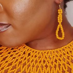 Tangerine Orange Beaded Collar Necklace Set. Hand Made By Adametu Collection Elegant Yellow Beaded Earrings, Elegant Yellow Beaded Earrings With Gold Beads, Elegant Yellow Jewelry With Tiny Beads, Elegant Teardrop Beaded Necklaces, Teardrop Beaded Necklace For Party, Elegant Yellow Beaded Necklaces With Tiny Beads, Tiny Beads Party Earrings, Summer Party Beaded Necklaces With Large Beads, Elegant Orange Beaded Necklaces For Party