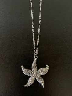 "Large nicely detailed silver tone starfish necklace, starfish necklace, starfish pendant, necklace starfish, silver starfish, beach necklace, ocean necklace, star fish  Pendant measures 2\" L X 1 3/4\" W.  Choice of chain length.   ★ Want to see more?  Please visit my shop at: https://www.etsy.com/shop/DesignsByPeg" Star Fish Necklace, Adjustable Silver Starfish Necklace, Blue Starfish Sterling Silver Necklace, Blue Sterling Silver Starfish Necklace, Elegant Star-shaped Necklace With Starfish Charm, Ocean Necklace, Dream Date, Starfish Pendant, Starfish Necklace