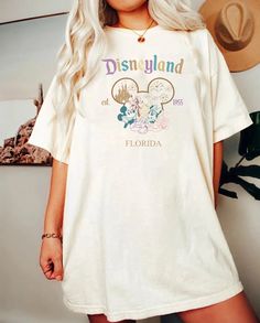 Disney Summer Shirt With Letter Print, White Tops With Letter Print For Disney Trips, White Crew Neck Top For Disney Trips, White T-shirt For Disney Trips In Summer, White Graphic Tee For Disney Trips, Summer Crew Neck Shirt For Disney Fan Events, Letter Print Short Sleeve Tops For Disney Trips, Disney Summer T-shirt With Letter Print, Summer Disney T-shirt With Letter Print