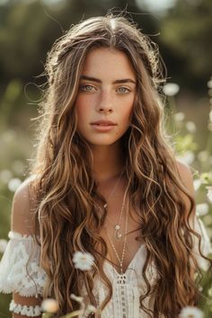 Long wavy hair offers a timeless allure, blending elegance with a touch of wild grace. Whether you’re looking for a low-maintenance daily look or an elegant evening style, these ideas will inspire you to embrace and accentuate your waves. Simple Long Hair Wedding Hairstyles, Ethereal Bridesmaid Hair, Boho Wavy Wedding Hair, Wedding Hair Beachy Waves, Romantic Long Hairstyles, Undone Bridal Hair, Boho Hair Down, Wavy Bridal Hair Long