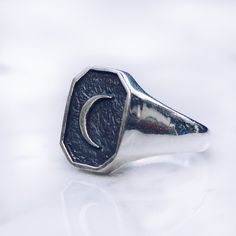 Celestial crescent moon sterling silver ring in both men and women's sizing. A crescent moon symbolizes a time of transition, creating a reminder of its ever-changing ways. Available in Brass https://etsy.me/3bqY9On Ring Size Available in all sizes. Please be sure to find your exact ring size for the finger you want before ordering. See image chart above or you can use the chart on my website as a guide - https://jewelrylab.co/pages/ring-sizing-tips Every piece is handcrafted in Bali and made wi Sterling Silver Oval Rings With Moon Phase, Sterling Silver Oval Rings With Moon Phase Detail, Minimalist Crescent Moon Charm Ring, Silver Oval Moon Phase Ring, Silver Oval Ring With Moon Phase, Silver Oval Rings With Moon Phase, Celestial Silver Signet Ring, Spiritual Crescent Moon Charm Ring, Silver Moon-shaped Celestial Ring