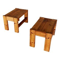 two wooden tables sitting next to each other