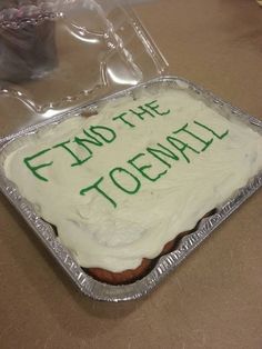 a cake with frosting that says find the toewell on it in green writing