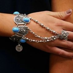 Silver Chain Finger Bracelet Turkish Coin Pendant Hans Chain Beautiful Silver Tone Hand Chain With Turquoise Accents Ring Is Adjustable Metal :Zinc Alloy Nickel Free Bracelet Is 9” Long Bohemian Silver Chain Bracelet With Adjustable Chain, Bohemian Silver Chain Bracelets, Bohemian Silver Bracelets With Adjustable Chain, Adjustable Blue Chain Bracelet For Party, Bohemian Silver Chain Metal Bracelet, Bohemian Bracelet With Silver Chain, Bohemian Blue Chain Bracelet As A Gift, Bohemian Silver Chain Bracelet, Bohemian Blue Chain Bracelet For Gift