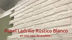 a white brick wall with the words papel ladrillo rustico blanco on it